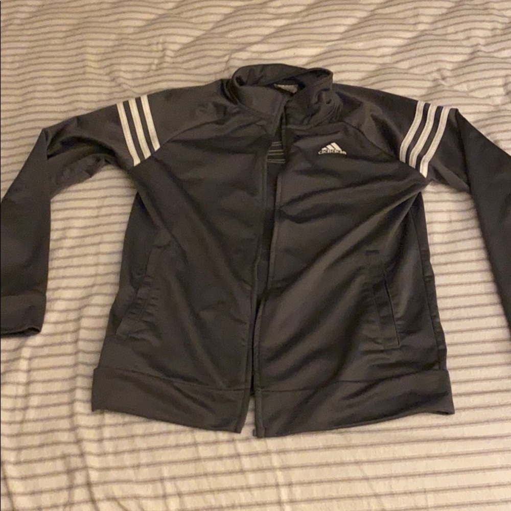 A gray Adidas light zip up